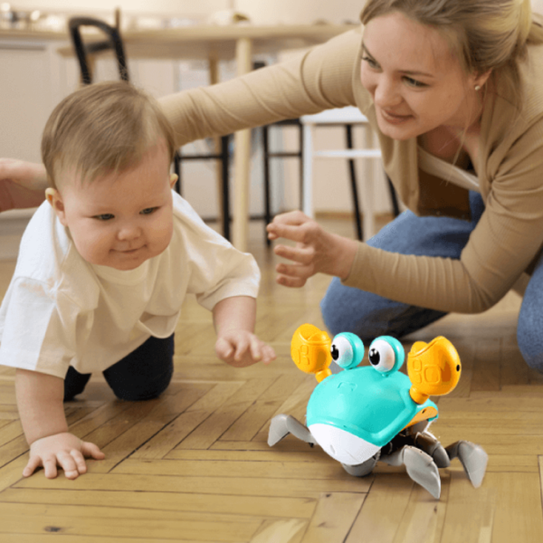 baby and mum playing with CrabbyCruiser